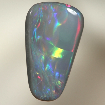 SOLID SEMI BLACK OPAL Rolling flashes of multicolours